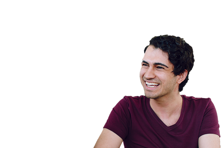 Male student smiling and laughing