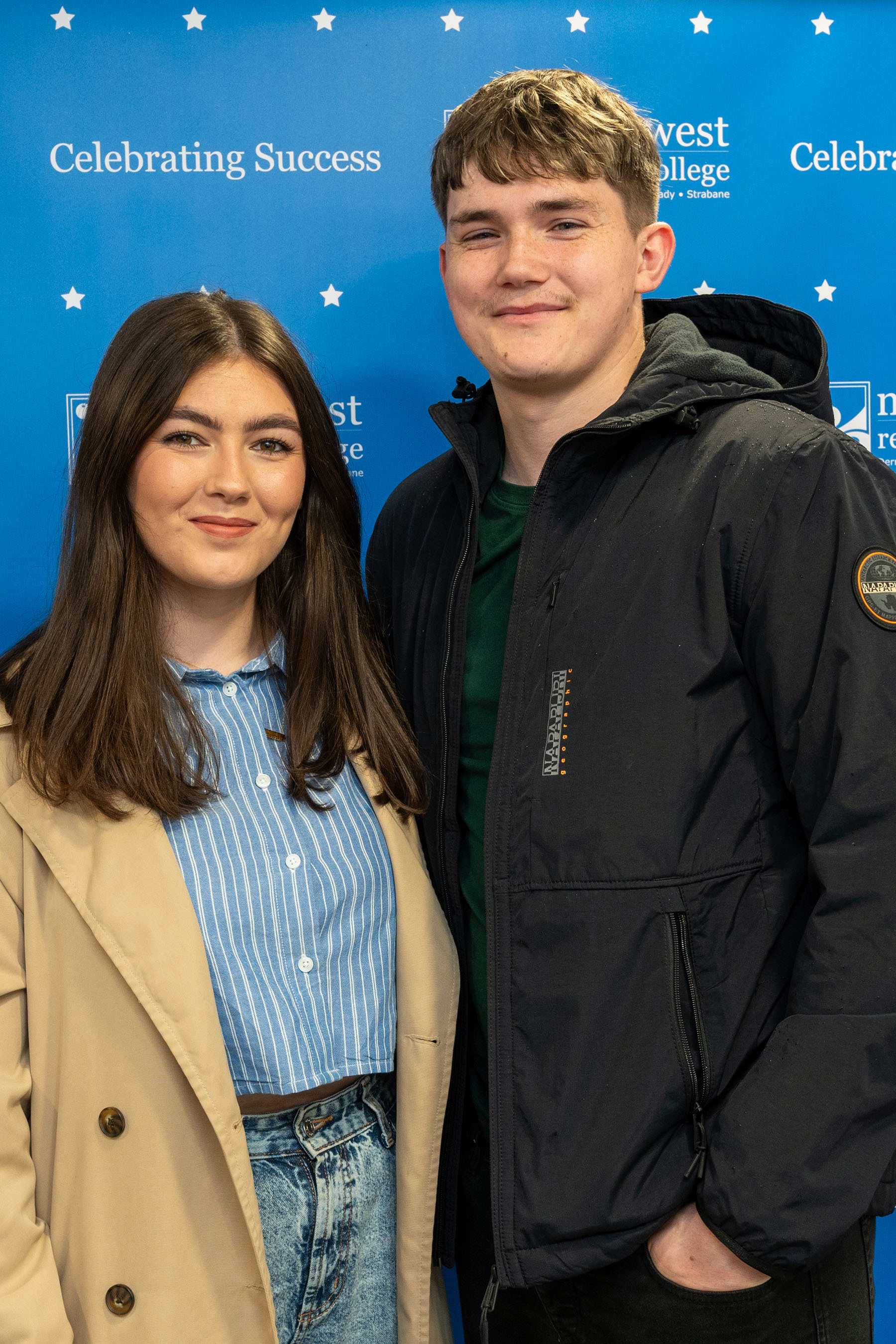 Two people at celebration event.