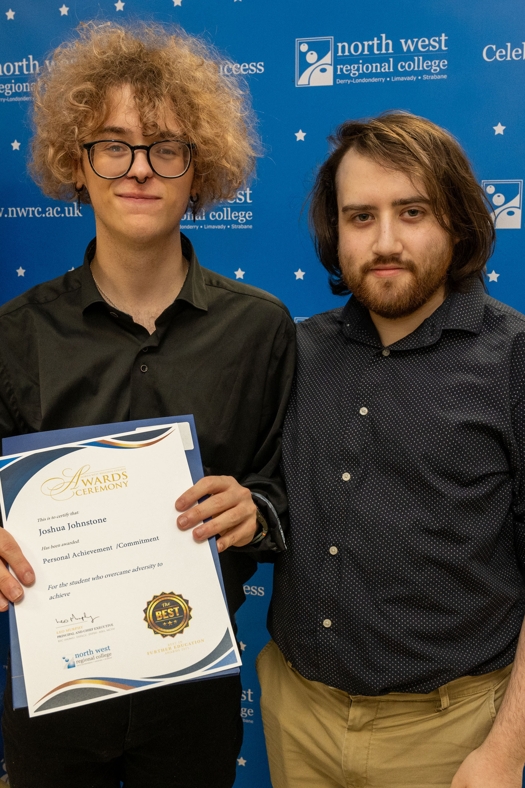 Two people at celebration event.
