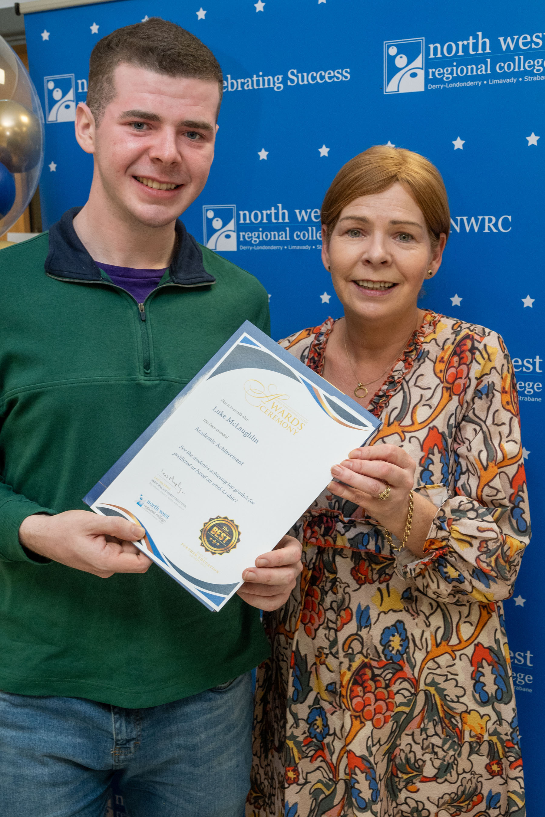 Two people at celebration event.