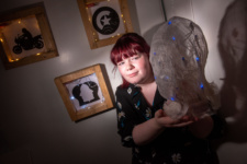 Student pictured with art scuplture