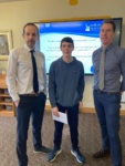 Computing student Adam Proctor with lecturer Thomas Moore and Campus Manager Luke McCloskey.