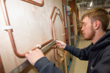 Dion Connor competes in Plumbing at NWRC's Skills competition at Springtown Campus.