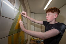 Charlie King Magee competes in Tiling at the NWRC Skills competition at Springtown Campus. (Pic Martin McKeown).