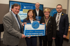 Five people pictured at the opening of springtown campus