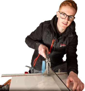 Apprenticeship Tiler cutting tile