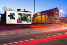 Outdoor billboard advert on busy road