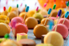 Coloured macarons pictured at college graduation ceremony