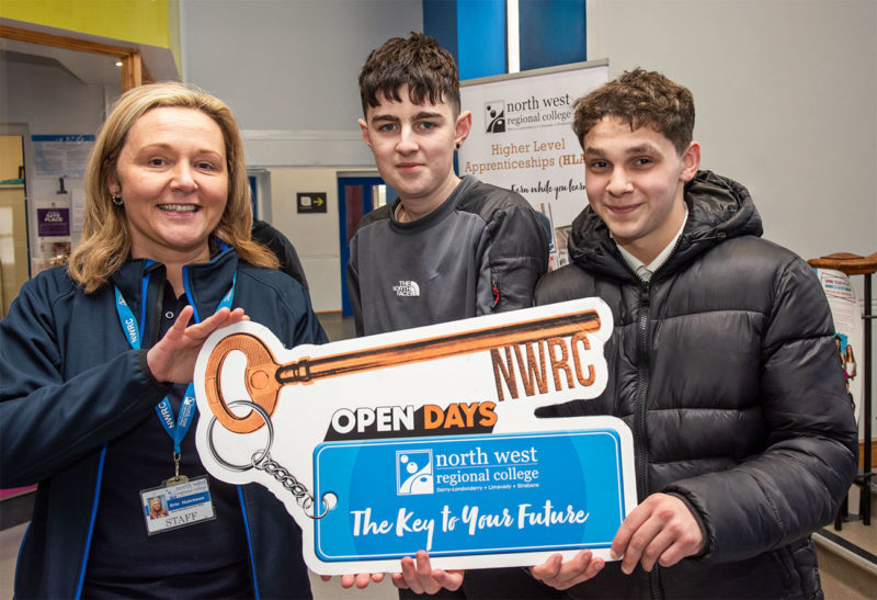 Erin, Marketing & PR Officer, with two prospective male students