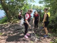 four young females doing outdoor orientation