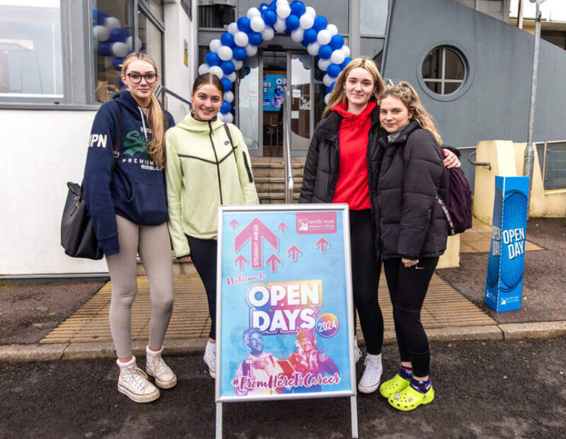 four girls stand outside strand road campus at NWRC Open Day