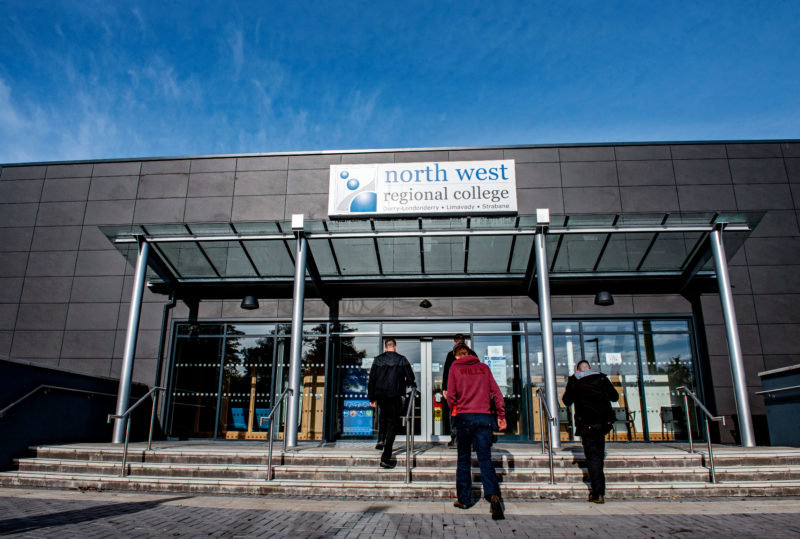 Group of male students walk into NWRC Springtown Campus