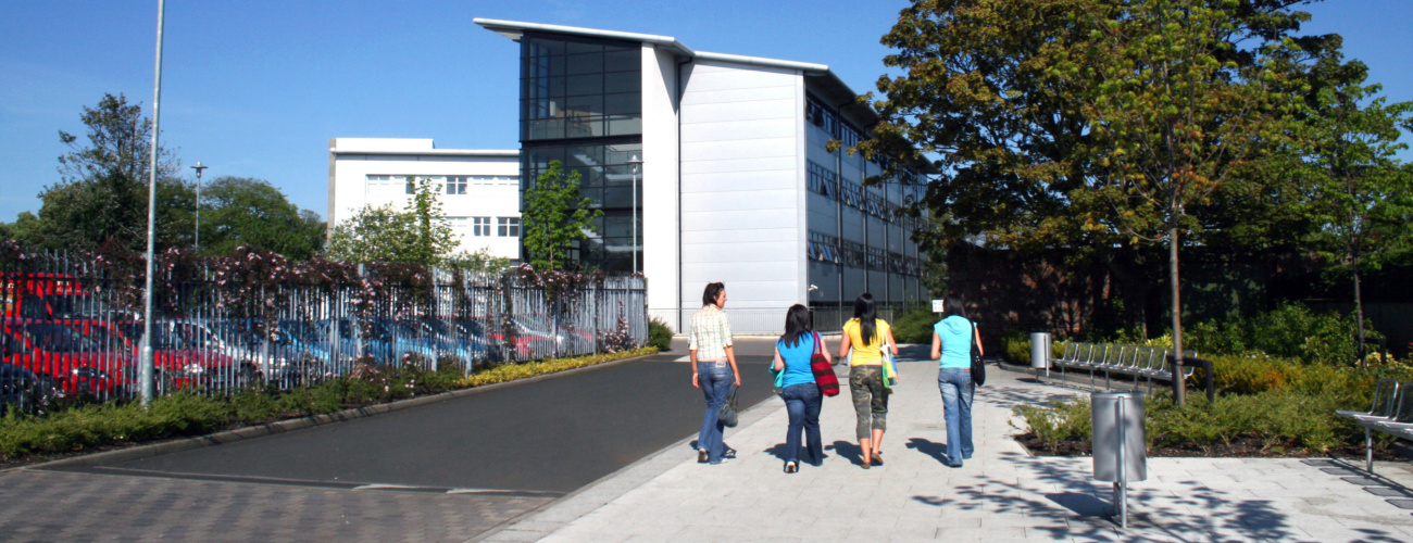 Group of 4 female walking towards Limavady college campus