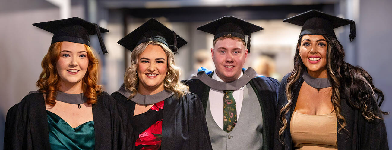 Group of graduates smiling together