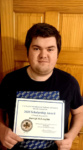 Darragh McLaughlin pictured with his scholarship.