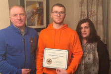 Rory Mullan who received one of the scholarships pictured with his parents Roisin and Damian Mullan.