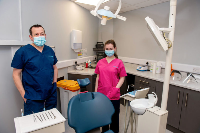 Niamh assists Dr Jamie Pirie during her work placement at Braid Dental