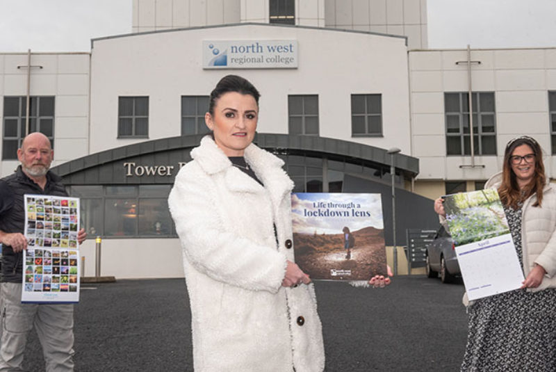 NWRC staff holding calendars