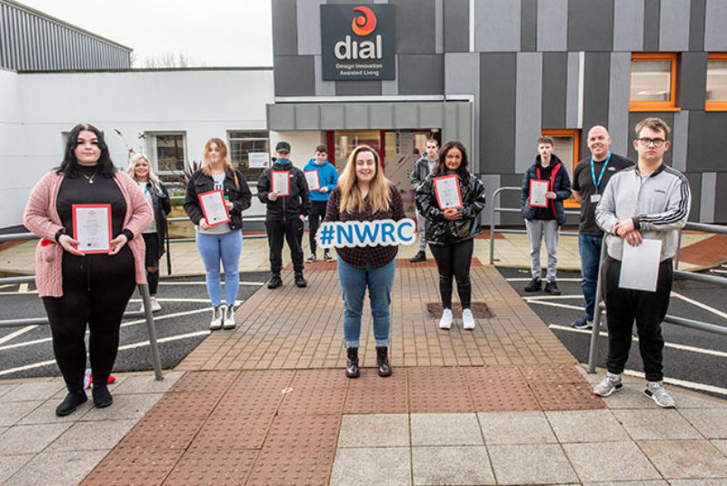 Group of NWRC students standing socially distanced outside DIAL building