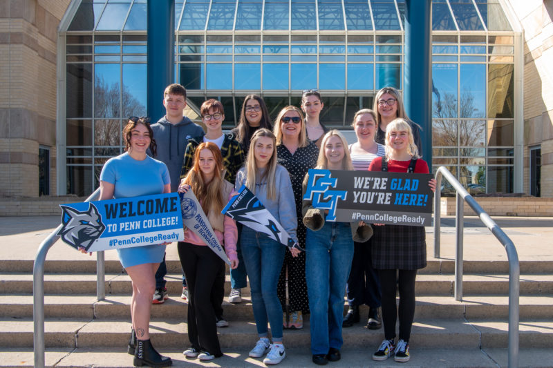 Students pictured outside a building