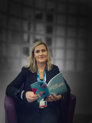 Picture of woman reading a course guide