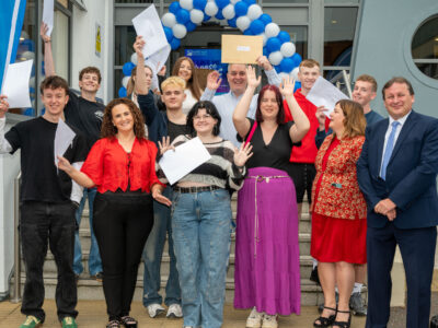 Minister for the Economy visits NWRC to meet with students receiving exam results