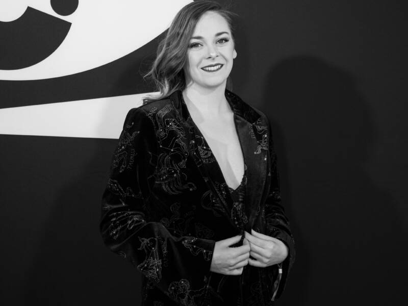 Black and white picture of a lady at an awards event